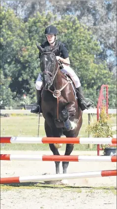 ??  ?? Giddy-up . . . Cobram and District Equestrian Club’s Jordyn Lee-Madgwick starts a jump.