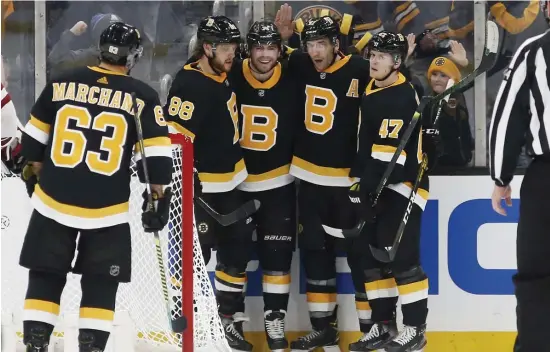  ?? AP File ?? COUNT ON THEM: The Bruins’ No. 1 power play unit should have no trouble getting back into form once the season resumes.