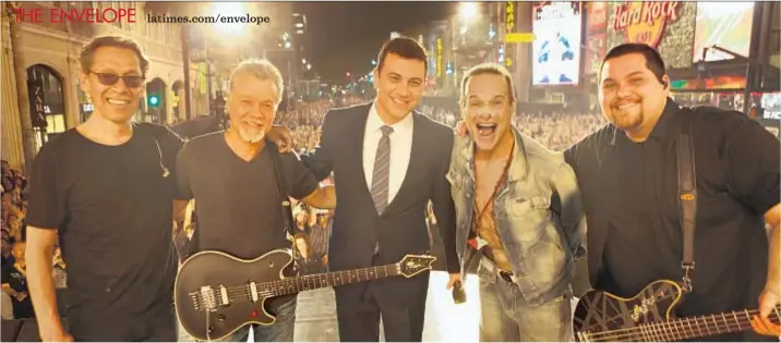  ?? Randy Holmes
ABC ?? JIMMY KIMMEL, center, hosted Van Halen ( Alex Van Halen, left, Eddie Van Halen, an injured David Lee Roth, Wolfgang Van Halen) on Hollywood Boulevard.