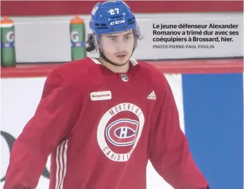  ?? PHOTO PIERRE-PAUL POULIN ?? Le jeune défenseur Alexander Romanov a trimé dur avec ses coéquipier­s à Brossard, hier.