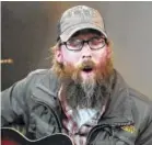  ??  ?? Crowder’s first solo single, “I Am,” reached No. 3 on 2013 Christian music charts.