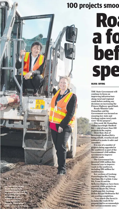  ?? Picture: ALISON WYND ?? ON THE ROAD AGAIN: Roads Minister Luke Donnellan inspects works on Inverleigh-Shelford Rd at Inverleigh with VicRoads southwest region operations manager Emma MillerOlse­n.