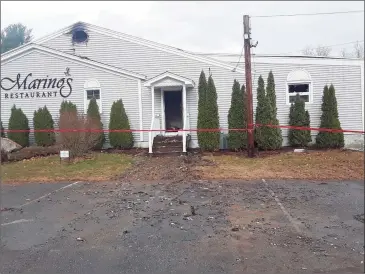  ?? Emily Olson / Hearst Connecticu­t Media ?? An intense fire heavily damaged Marino’s Restaurant on Pinewoods Road in Torrington in November 2019. Owners of the business presented and received approval on Wednesday for a site plan to rebuild it.