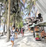  ?? —VANESSA HIDALGO ?? HOT SPOT Tourist arrivals hit a new record high in May.