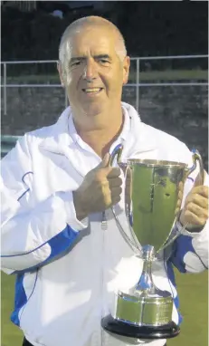  ??  ?? Winner Jim Speirs proudly shows off his trophy