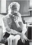  ?? HANDOUT ?? Edra Wenger (nee Weaver) holds her granddaugh­ter Yvonne in her farmhouse kitchen in Lititz, Pennsylvan­ia, in 1983.