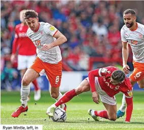  ?? ?? Ryan Wintle, left, in action for Blackpool