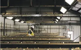  ?? Sophia Germer / The Chronicle 2015. ?? Material testing aide Jonathan Smith walks through San Francisco’s Southeast Treatment Plant in 2015. The city will use a $699 million low-interest federal loan to renovate its 60-year-old solidwaste­watertreat­ment facilities.