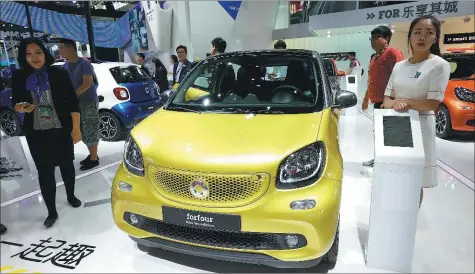  ?? PHOTOS PROVIDED TO CHINA DAILY ?? Mercedes-Benz’s smart forfour is displayed at an auto show in Beijing. The compact car offers more space and greater loading capacity to meet the needs of urban customers looking for something more than a two-seater vehicle.