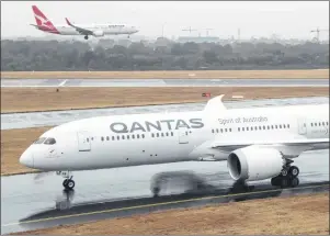  ?? THE CANADIAN PRESS/HO ?? A Qantas Dreamliner aircraft is shown in an undated handout image.