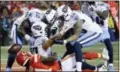  ?? CHARLIE RIEDEL THE ASSOCIATED PRESS ?? Tennessee Titans wide receiver Eric Decker (87) is congratula­ted by tight end Delanie Walker (82), wide receiver Rishard Matthews (18) and wide receiver Corey Davis (84) after his 22yard touchdown catch against Kansas City Chiefs defensive back Eric...