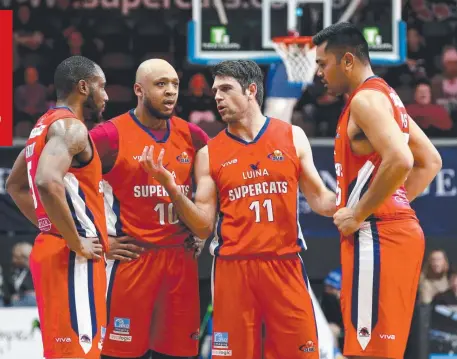  ??  ?? De Marcus Gatlin, John Davis, Nathan Herbert and Ma'alo Hicks discuss tactics on Saturday night. Picture: MIKE DUGDALE