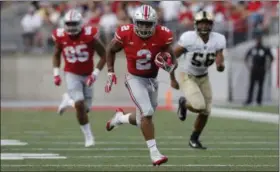  ?? ASSOCIATED PRESS FILE ?? Ohio State running back J.K. Dobbins carries against Army.