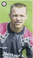  ??  ?? 44 Sporting a crew cut, Hughes poses in his Falkirk shirt at the beginning of the 1991/92 season.