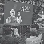  ?? ARUN CHANDRABOS­E/ AFP VIA GETTY IMAGES ?? People watch “India: The Modi Question” in Kochi, India, last month.