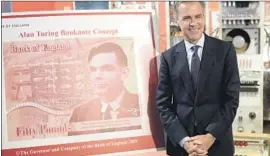  ?? Oli Scarff AFP/Getty Images ?? BANK OF ENGLAND Gov. Mark Carney unveils the concept design for the new 50-pound note featuring mathematic­ian Alan Turing in Manchester, England.