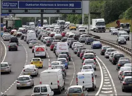  ??  ?? Jams: Drivers have faced daily delays on the M8 and M74