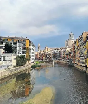  ?? Picture: Keith Tamkei ?? IF A RIVER SAYS ITS NAME Girona curves along the Onyar.