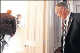  ?? [BUTCH DILL/THE ASSOCIATED PRESS] ?? Robert Bentley walks out of the room after resigning as Alabama governor on Monday in Montgomery.