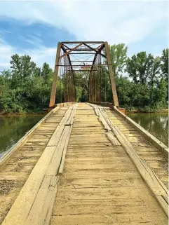  ?? The Sentinel-record/corbet Deary ?? Those embarking upon a drive along the suggested route will have the opportunit­y to experience crossing a steel bridge spanning the Main Fourche Lafave River.