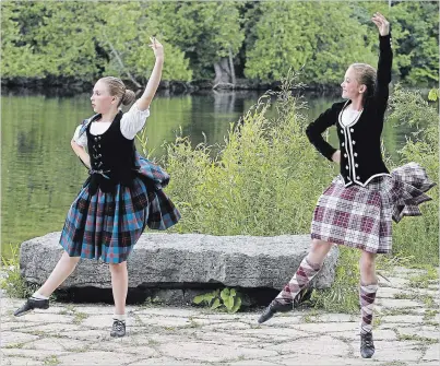  ?? CLIFFORD SKARSTEDT/EXAMINER ?? Dancers Ella Horner, left, and Islay Moore, both 11, from The Ard-Mhor School of Highland Dance perform June 22 at the Riverview Park and Zoo. The two competed at ScotDance Canada in Calgary over the weekend.