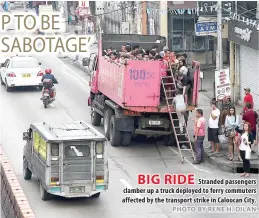  ?? PHOTO BY RENE H. DILAN ?? BIG RIDE Stranded passengers clamber up a truck deployed to ferry commuters affected by the transport strike in Caloocan City.