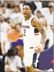  ?? Stephen Dunn / Associated Press ?? Tarin Smith and the UConn Huskies are 0-6 in true road games this season.