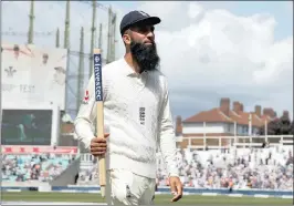  ??  ?? England all-rounder Moeen Ali takes his memento to mark his hatrick against South Africa. The fourth Test starts on Friday.