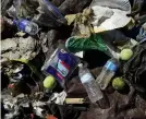  ??  ?? The trash collected by three volunteers in less than 30 minutes sits on a tarp at Boulder Reservoir.