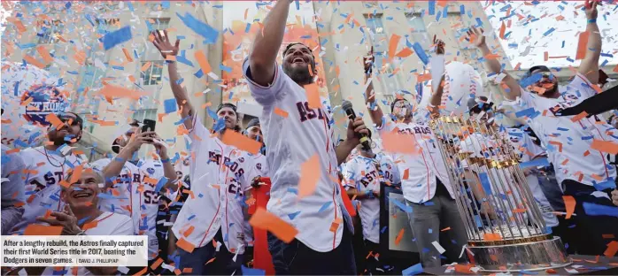  ?? | DAVID J. PHILLIP/ AP ?? After a lengthy rebuild, the Astros finally captured their first World Series title in 2017, beating the Dodgers in seven games.