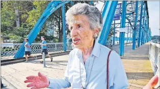  ?? Ap File photo ?? Ruth Sulzberger Holmberg talks about the Walnut Street Bridge plaques at a ceremony in Chattanoog­a, Tenn., in August 2011.