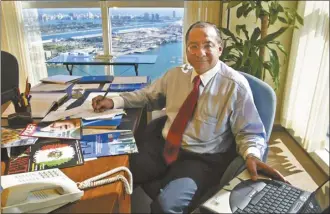  ?? Raul Rubiera / Miami Herald file photo via AP ?? Manuel Rocha sits in his office at Steel Hector & Davis in Miami in January 2003, joining the firm to help open doors in Latin America. On Thursday, Rocha, 73, told a judge he would admit to federal counts of conspiring to act as an agent of a foreign government, charges that could land him behind bars for several years.