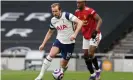  ?? Photograph: Getty Images ?? Harry Kane skips clear of Aaron WanBissaka in another display in which his all-round team play stood out.