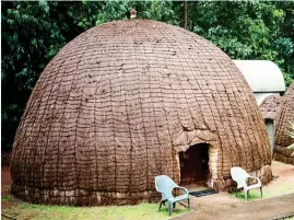  ??  ?? DOME FROM HOME: Grass and mud huts at the Mlilwane Sanctuary