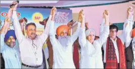  ?? HARSIMAR PAL SINGH/HT ?? BKU Haryana leader Gurnam Singh Charuni (orange turban) with members of the newly launched Bhartiya Arthik Party in Ludhiana on Monday.