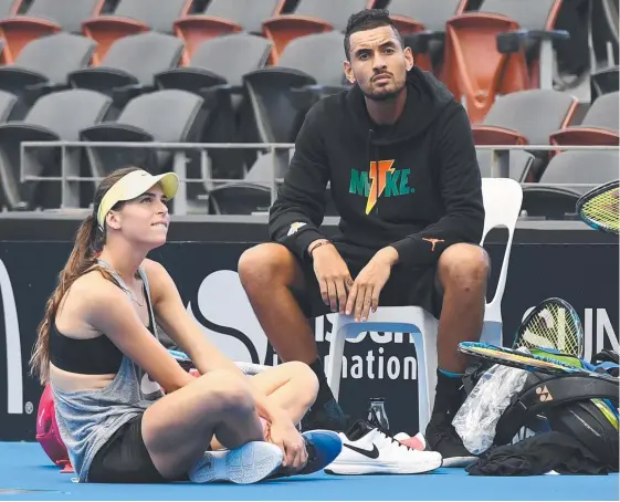  ?? Picture: DAN PELED ?? Nick Kyrgios and girlfriend Ajla Tomljanovi­c practise yesterday at Pat Rafter Arena in Brisbane.