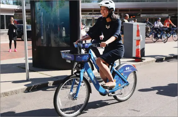  ?? NANCY LANE — BOSTON HERALD ?? Bike lanes and fewer parking spots are a few items on Mayor Michelle Wu’s agenda.