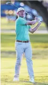  ?? PHOTO: THOMAS SHEA — USA TODAY SPORTS/REUTERS ?? Brandt Snedeker hits an approach shot on the 18th fairway during the first round of the Houston Open golf tournament at Memorial Park Golf Course.
