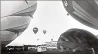  ?? THE PALM BEACH POST 1987 ?? Balloons rise over the Polo Stadium in Wellington during the “Hare and Hounds” Balloon Regatta in May 1987. A Wellington Historical Society is in the works.