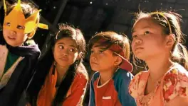  ??  ?? “Patintero” kids (from left): Claude Adrales, Nafa Hilario Cruz, William Buenavente and Isabel “Lenlen” Frial