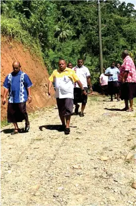  ?? Photo: SUPPLIED ?? Minister for Rural and Maritime Developmen­t and Disaster Management Inia Seruiratu inspects the Naitauvoli Access Road in Naitasiri.