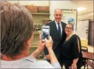  ?? EVAN BRANDT — DIGITAL FIRST MEDIA ?? Renee Gorski, who is a SNAP recipient and spoke Monday about the difficulti­es she will face if the program is cut in the farm bill now under considerat­ion in Congress, gets a photo with U.S. Sen. Bob Casey.