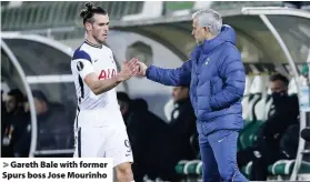  ??  ?? > Gareth Bale with former Spurs boss Jose Mourinho