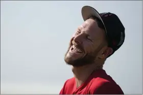  ?? BRYNN ANDERSON — THE ASSOCIATED PRESS ?? Boston Red Sox starting pitcher Chris Sale laughs during a spring training baseball practice on Friday, Feb. 17, 2023, in Fort Myers, Fla.