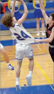  ?? PILOT PHOTO/BEV HARAMIA ?? Glenn’s Silas Kaser (right) and Triton’s Tyson Yates (24) will both be in action Friday night with the Falcons hosting No. 6 SB St. Joseph and the Trojans hosting Culver.