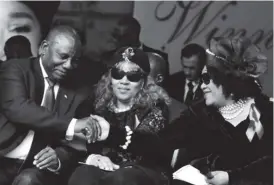  ??  ?? President Cyril Ramaphosa with Zenani Mandela-Dlamini and Zindzi Mandela at Winnie Madikizela­Mandela’s funeral in Orlando Stadium on Saturday. Sapa