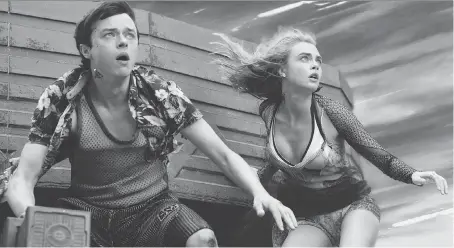  ?? TF1 FILMS PRODUCTION ?? Dane DeHaan, left, and Cara Delevingne kept a strict regimen for their roles in Valerian and the City of a Thousand Planets.