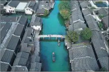  ?? HUANG ZONGZHI / XINHUA ?? Xizha scenic area is located in Wuzhen, featuring with the classic scenery of a Chinese water town.