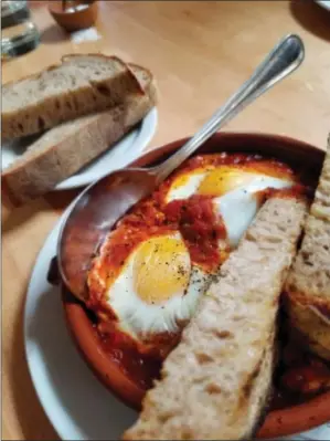  ?? PHOTO COURTESY OF JENNIFER GRAUE ?? Portland’s Tasty n Sons launched Shakshuka’s West Coast popularity when the chef put this savory brunch dish of eggs poached in a savory tomato-pepper stew on the menu.