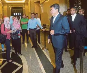  ??  ?? Datuk Seri Mohamad Hasan (second from right) leaving the Federal Court in Putrajaya yesterday.